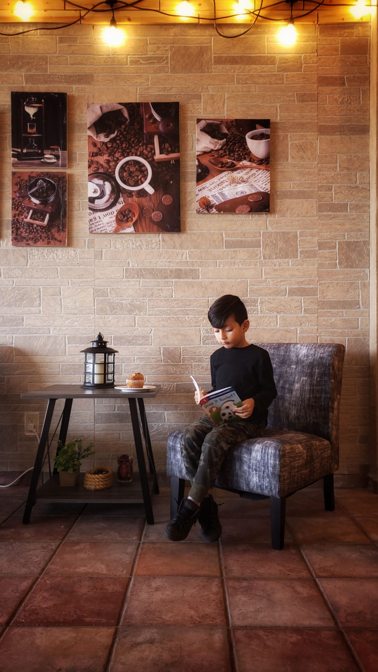 young boy reading a book